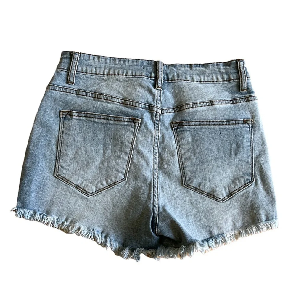 KanCan Estilo Light wash distressed women’s cut off Denim Jean shorts size 27